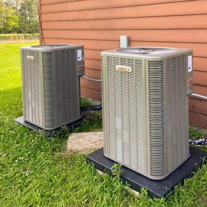 Two new outdoor AC units installed for replacement in Orange TX